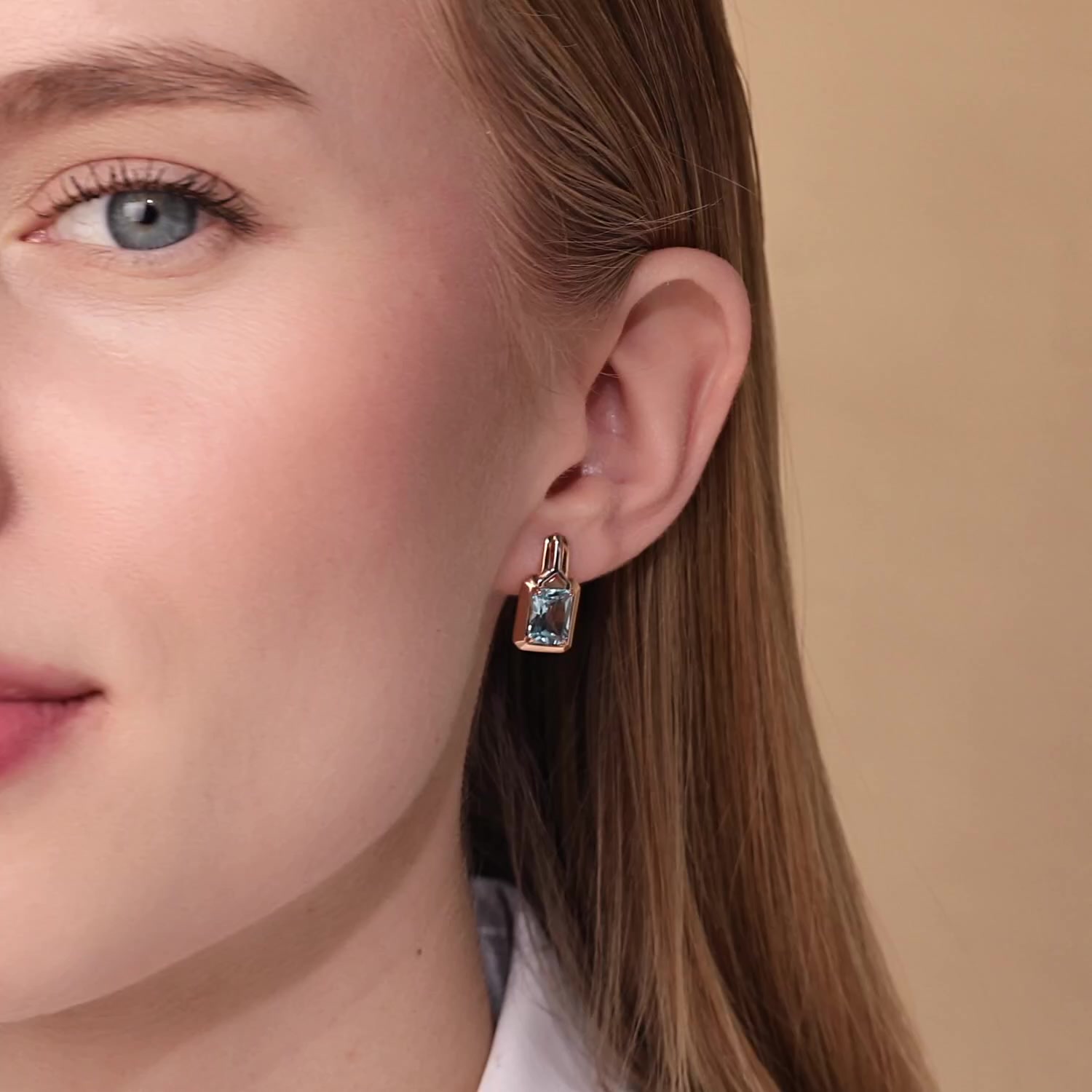 Золотые серьги с топазами Sky