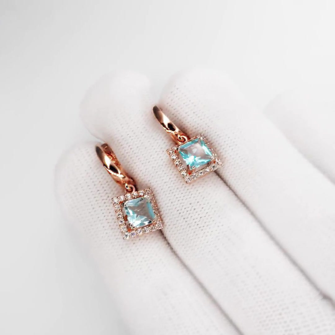 Золотые серьги с топазами Sky и фианитами