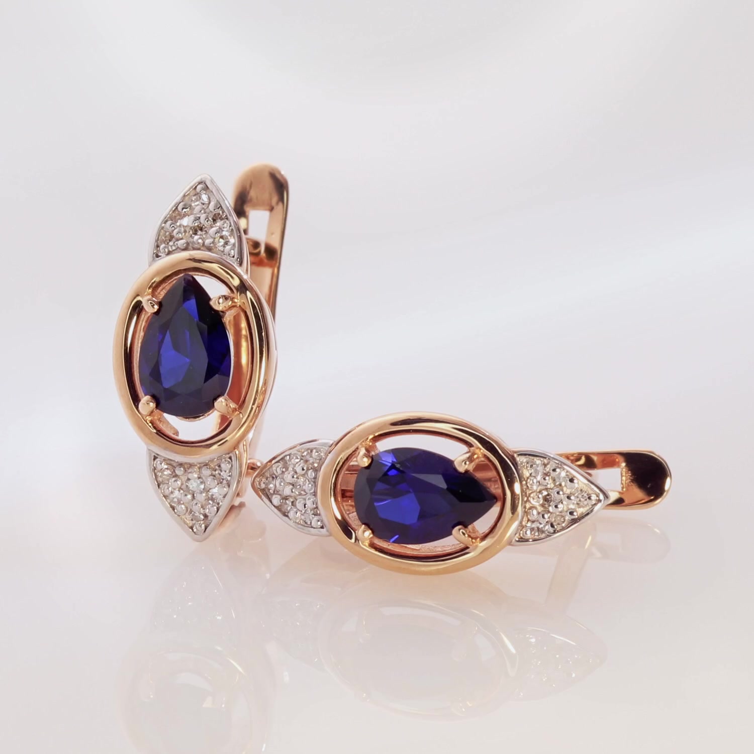 Золотые серьги с сапфирами выращенными и бриллиантами