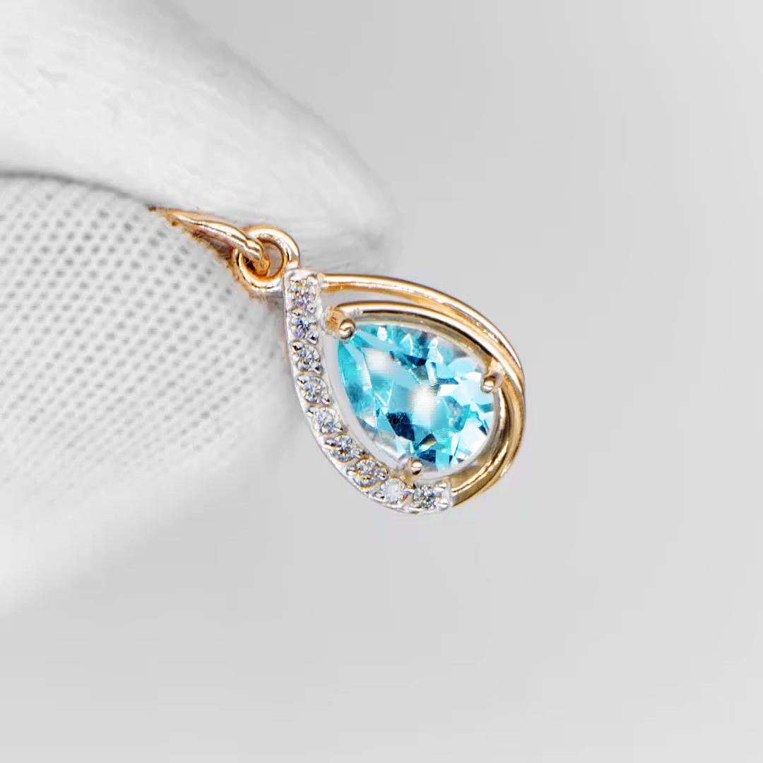 Золотая подвеска с топазом Sky и фианитами