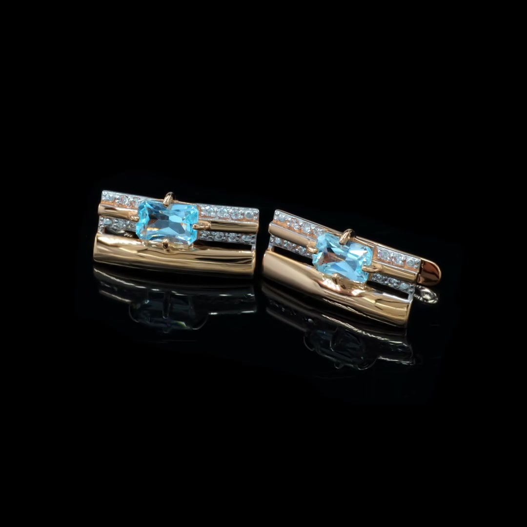 Золотые серьги с топазами Sky и фианитами
