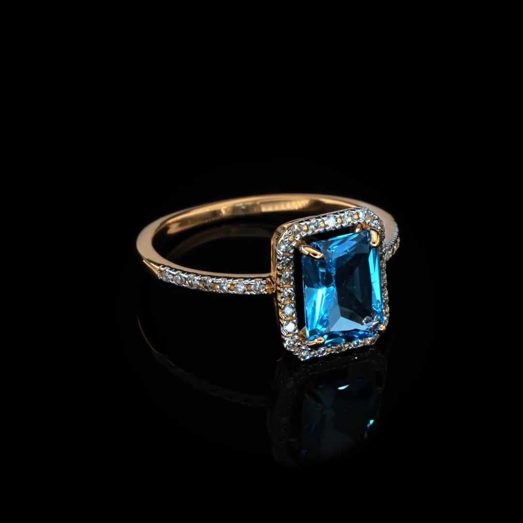 Золотое кольцо с топазом Swiss и бриллиантами