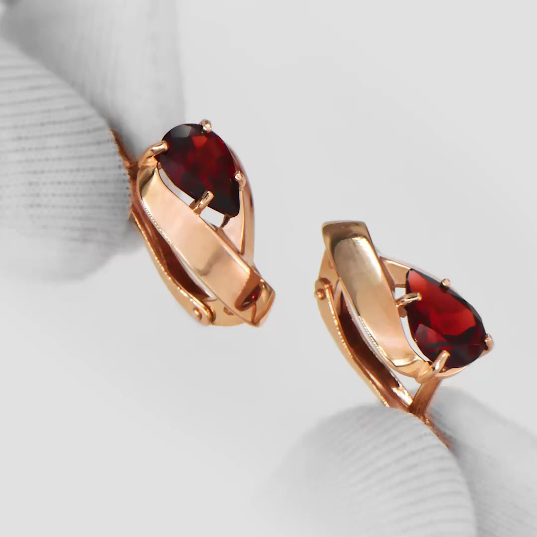 Золотые серьги с гранатом