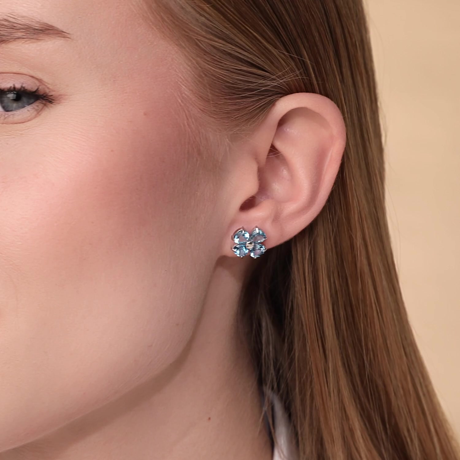 Золотые серьги с топазами Swiss