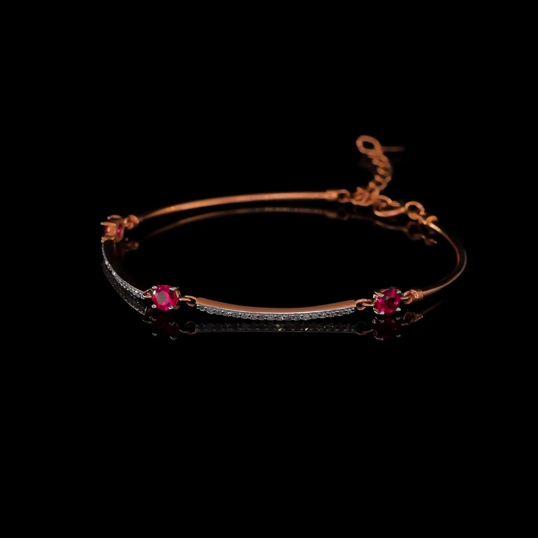 Золотой браслет с рубинами выращенными и бриллиантами