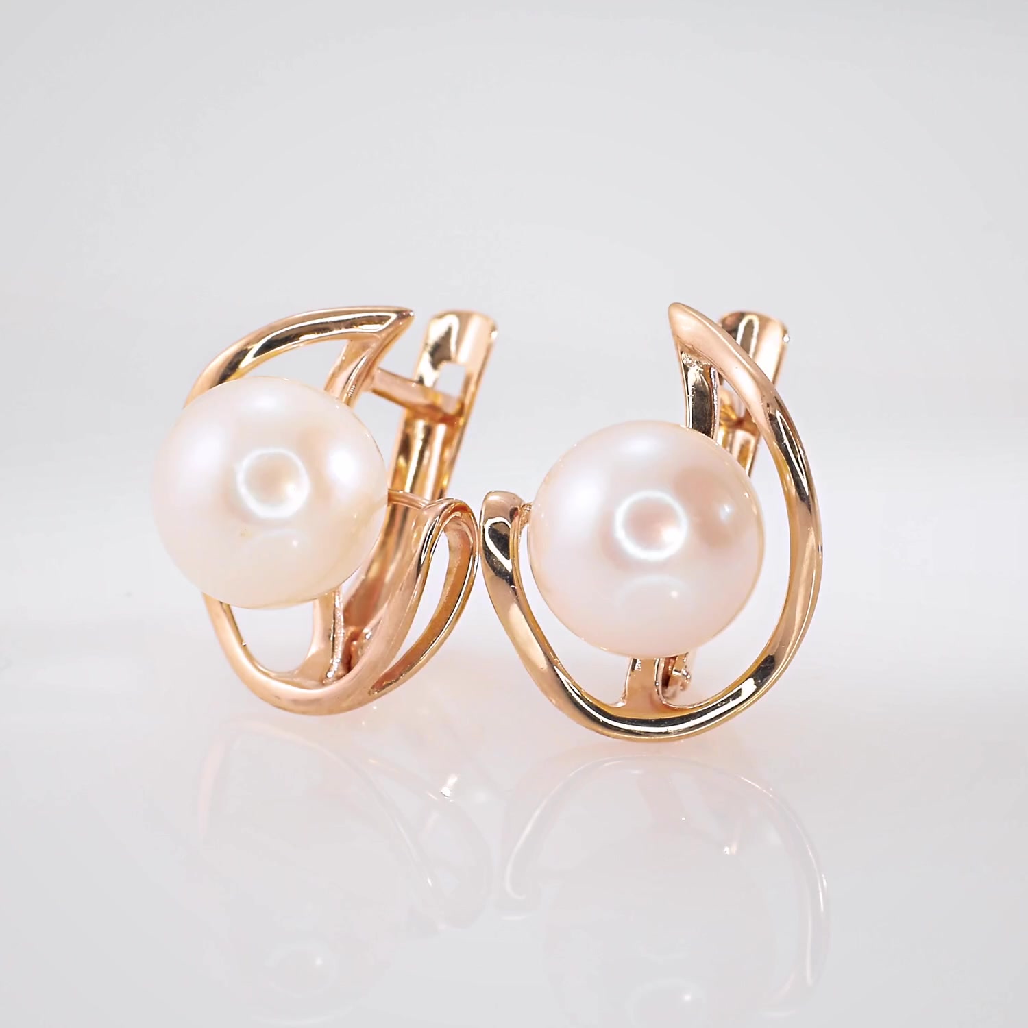 Золотые серьги с жемчугом