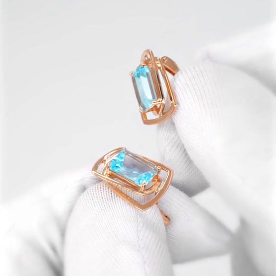 Золотые серьги с топазами Sky