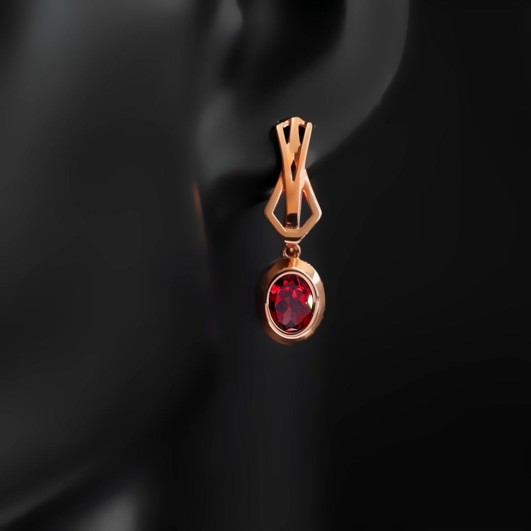 Золотые серьги с гранатом