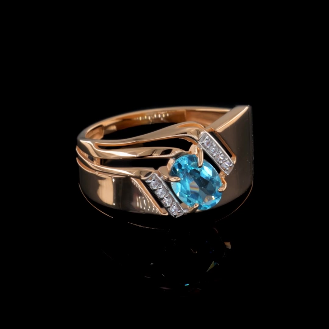Золотое кольцо с топазом Swiss и фианитами
