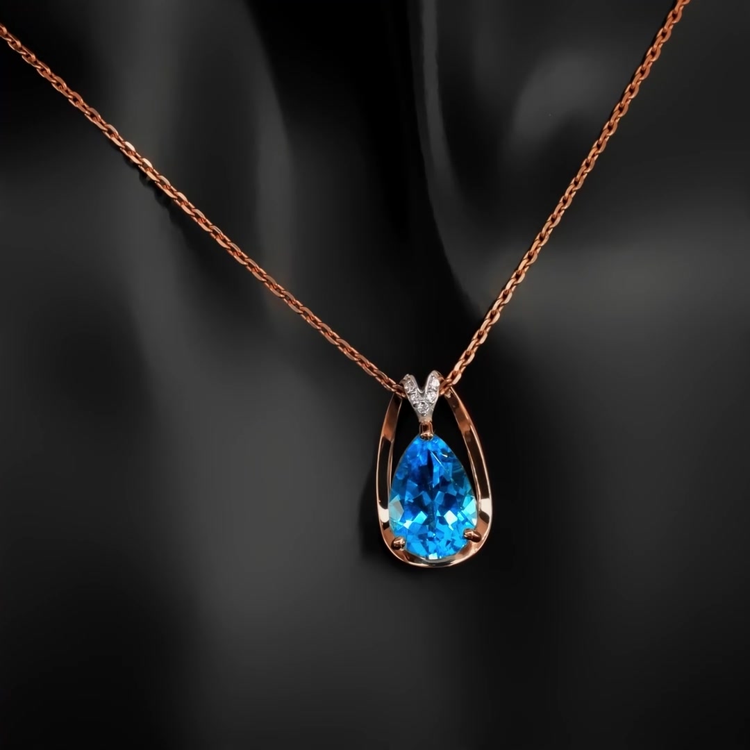 Золотая подвеска с топазом Swiss и фианитами