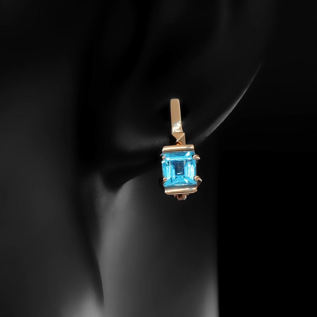 Золотые серьги с топазами Swiss