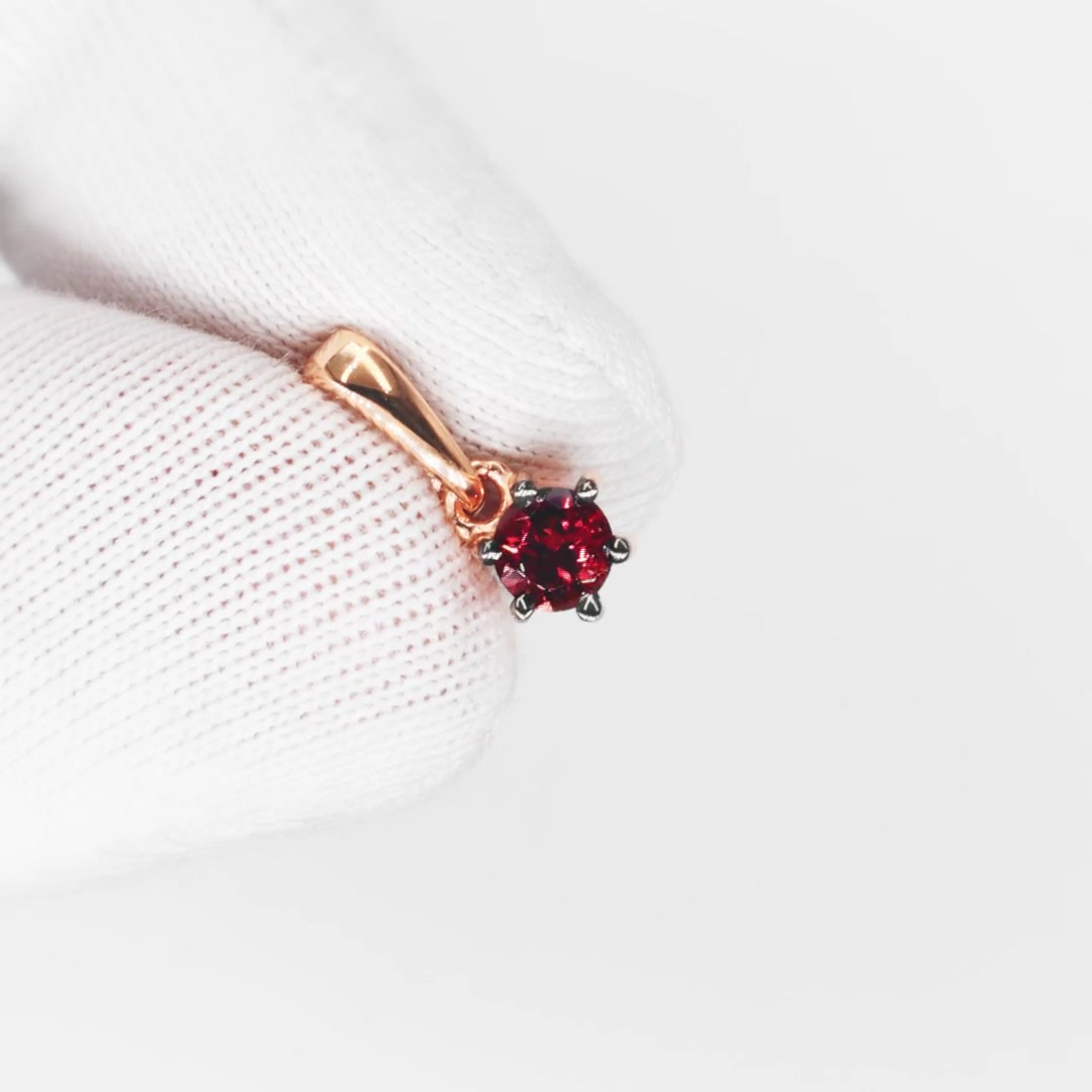 Золотая подвеска с турмалином