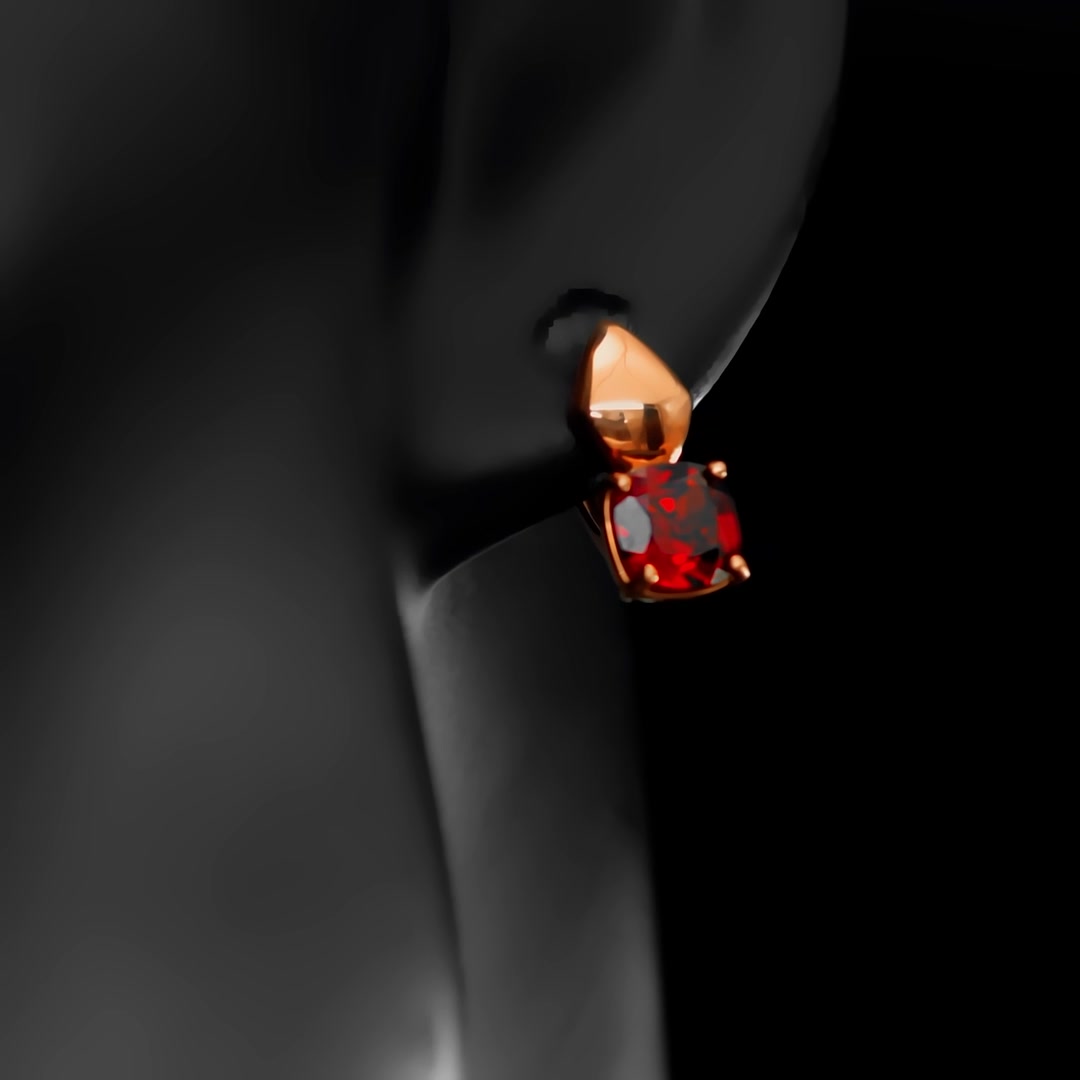 Золотые серьги с гранатом