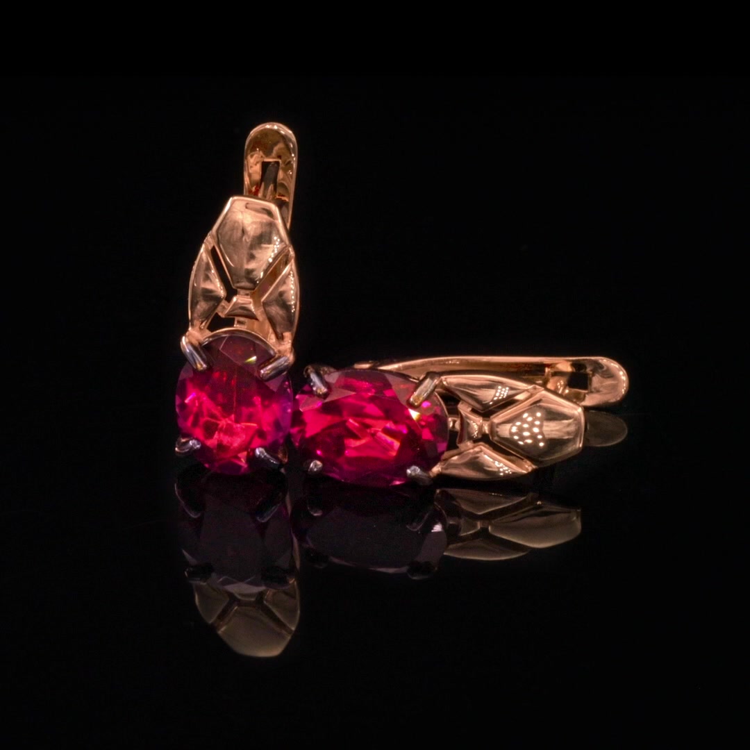 Золотые серьги с родолитами