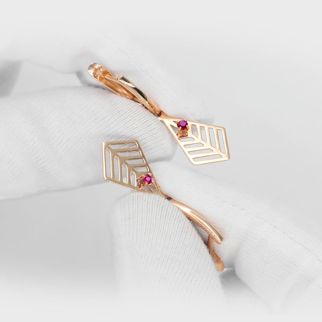 Золотые серьги с рубинами