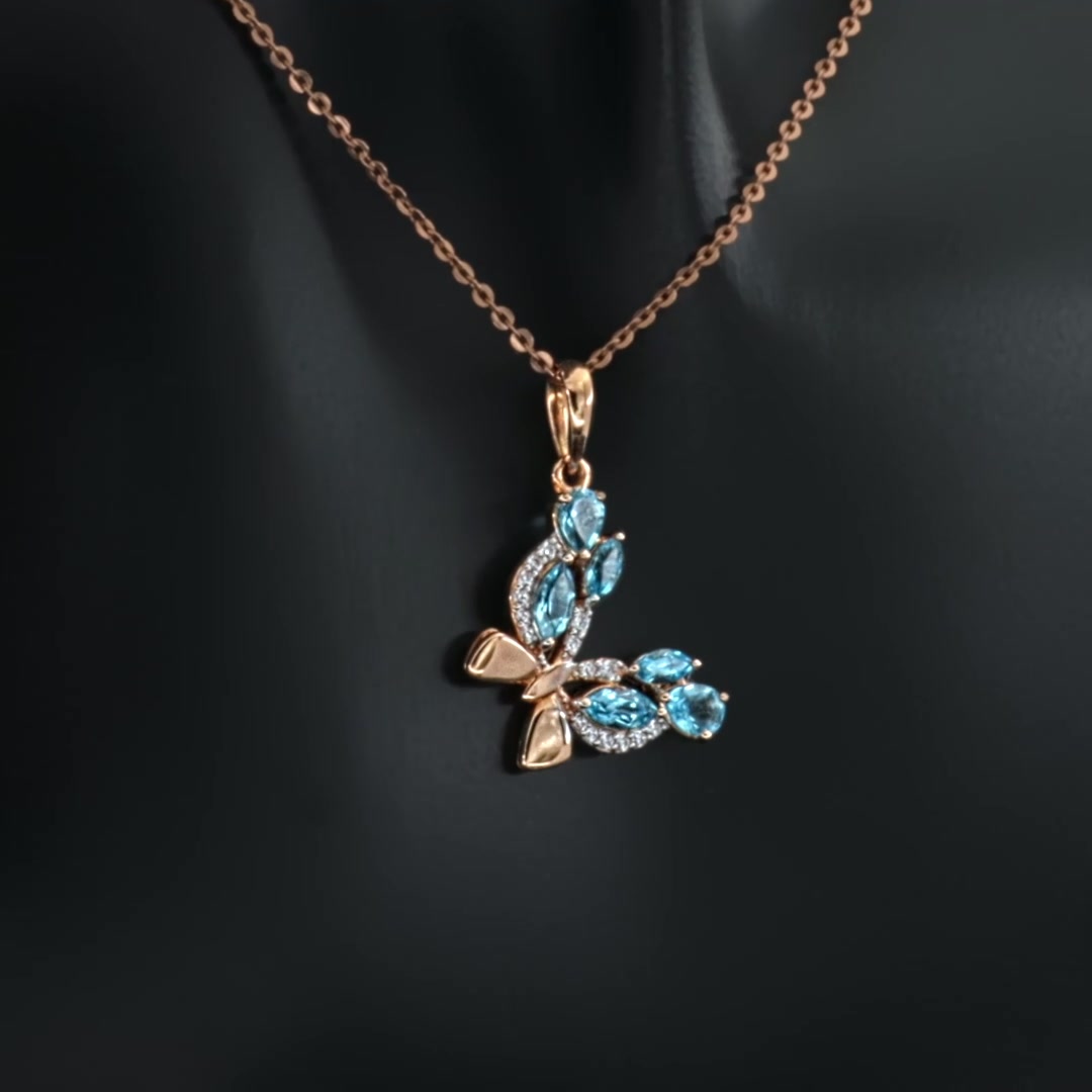 Золотая подвеска с топазами Swiss и фианитами
