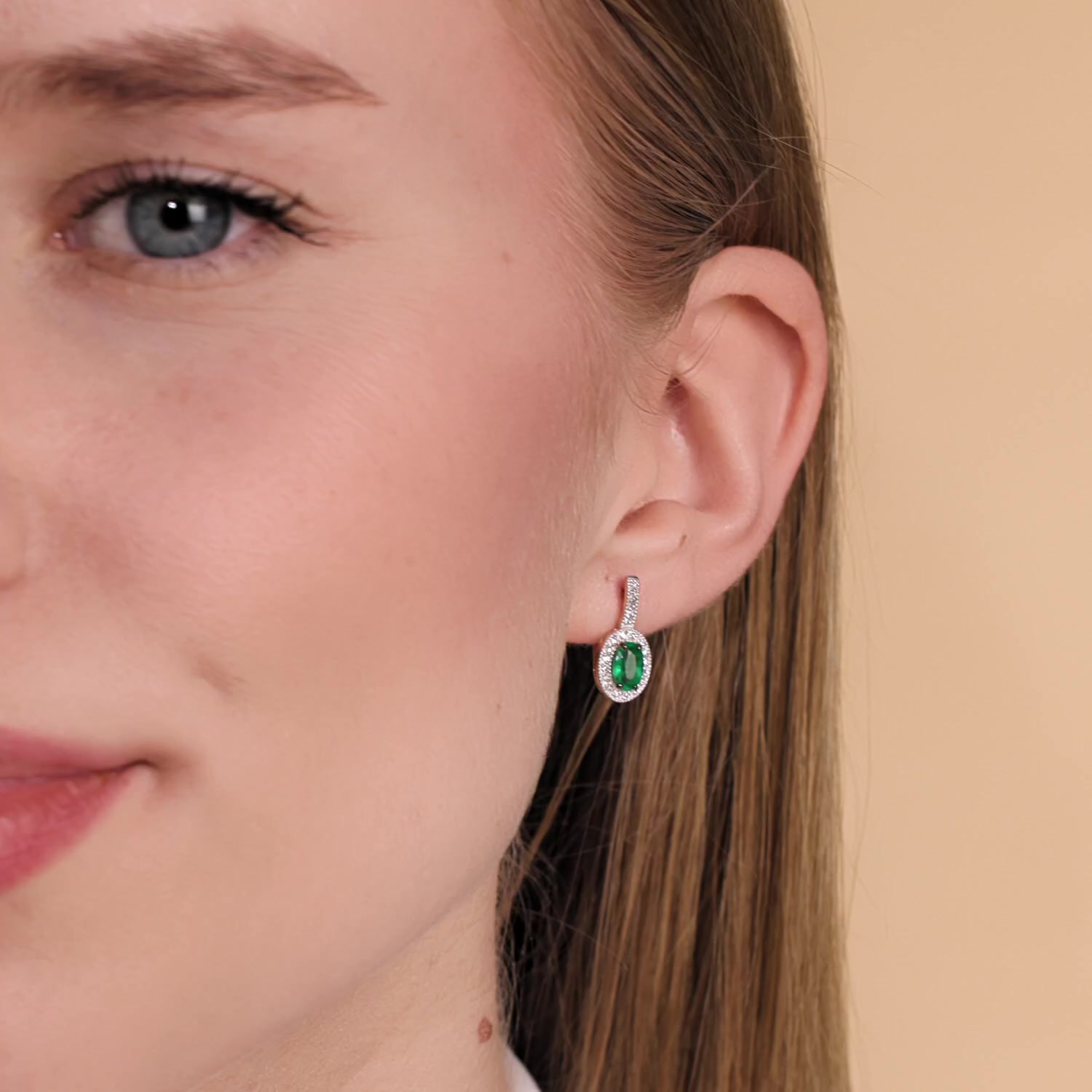 Золотые серьги с изумрудами и бриллиантами