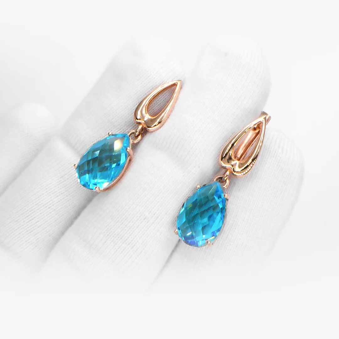 Золотые серьги с топазами Swiss