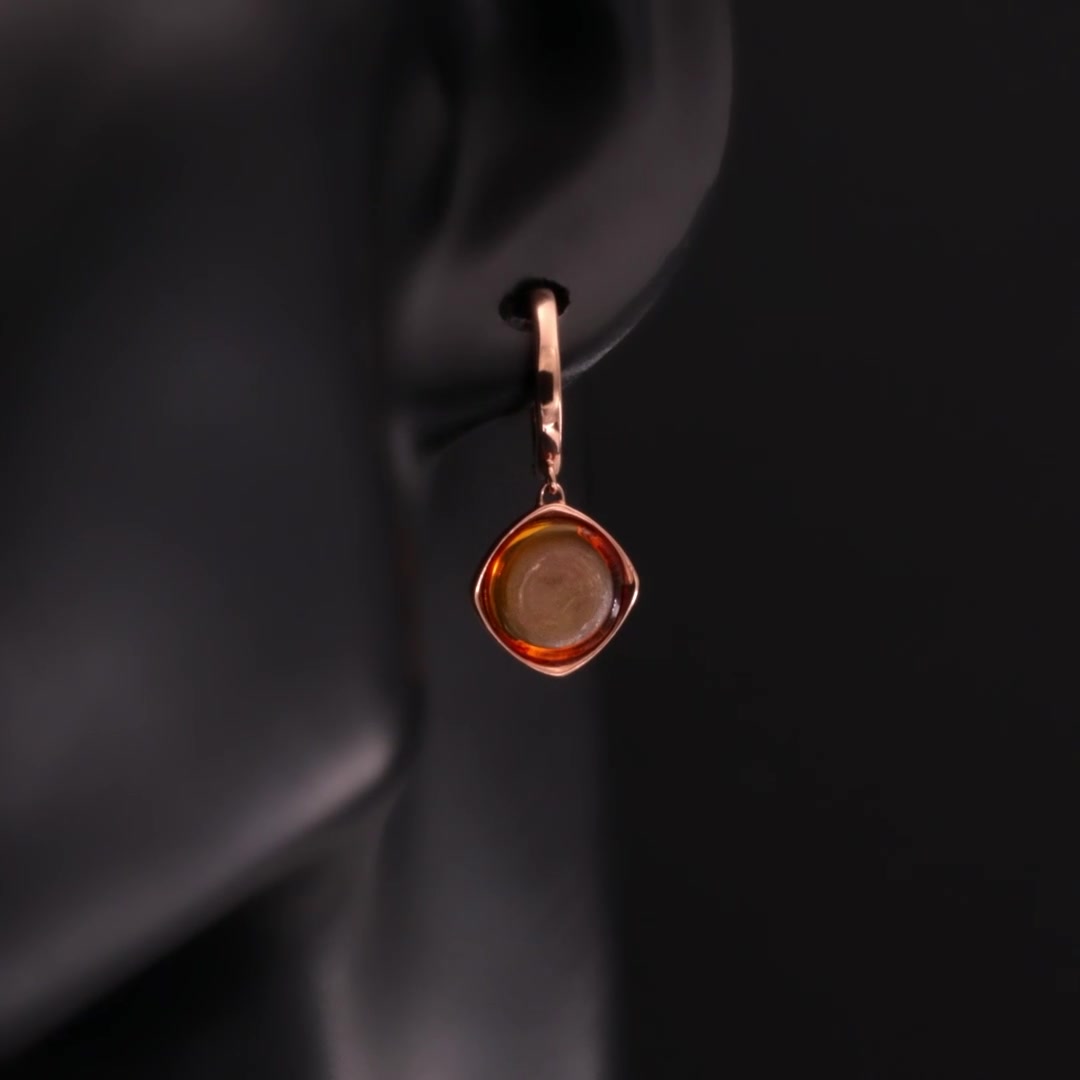 Золотые серьги с янтарем