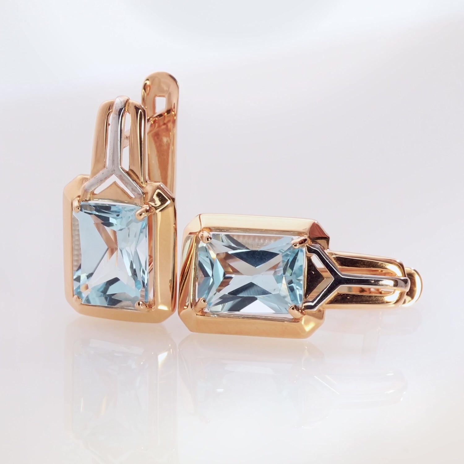 Золотые серьги с топазами Sky