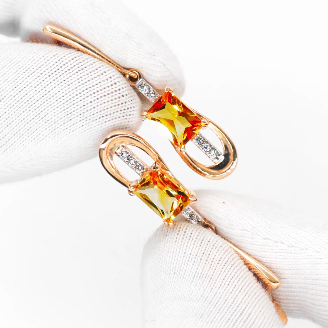 Золотые серьги с цитринами и фианитами с родированием