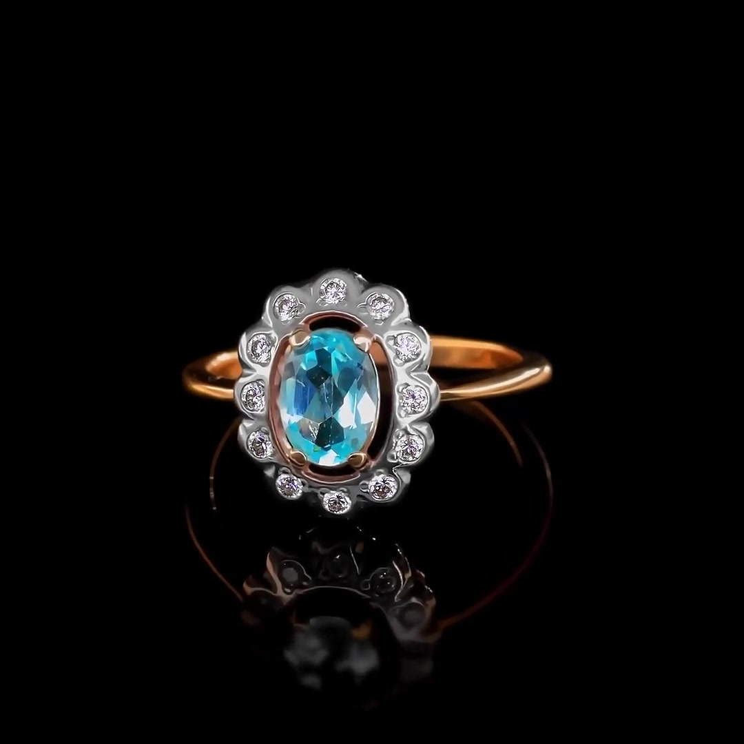 Золотое кольцо с топазом Swiss и фианитами