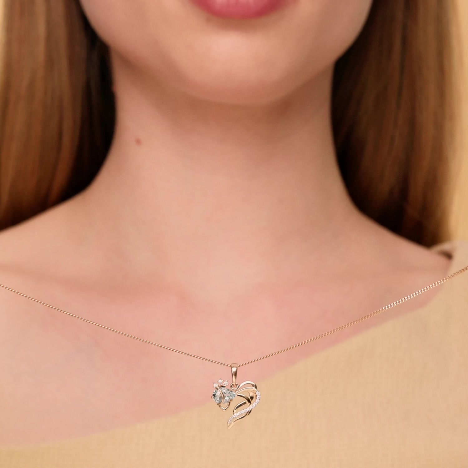 Золотая подвеска с топазом Sky и фианитами