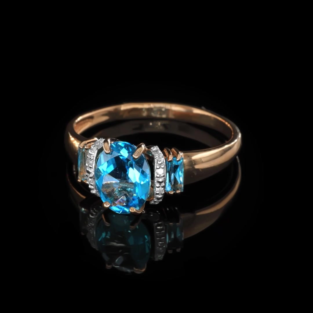 Золотое кольцо с топазами Swiss и бриллиантами