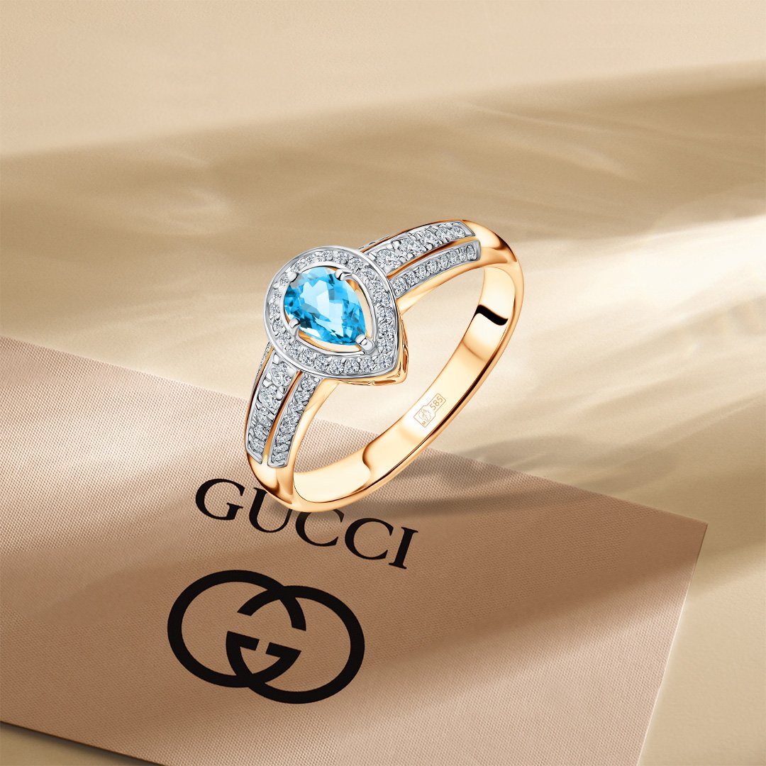 Золотое кольцо с топазом Swiss и бриллиантами