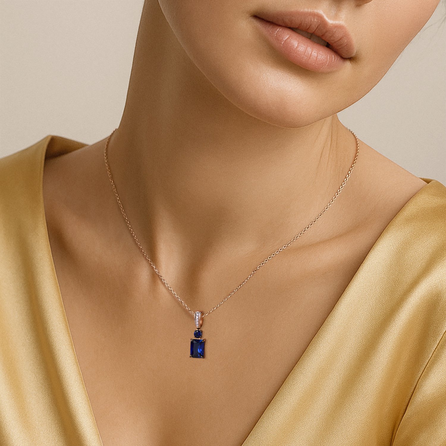 Золотая подвеска с сапфирами выращенными и бриллиантами