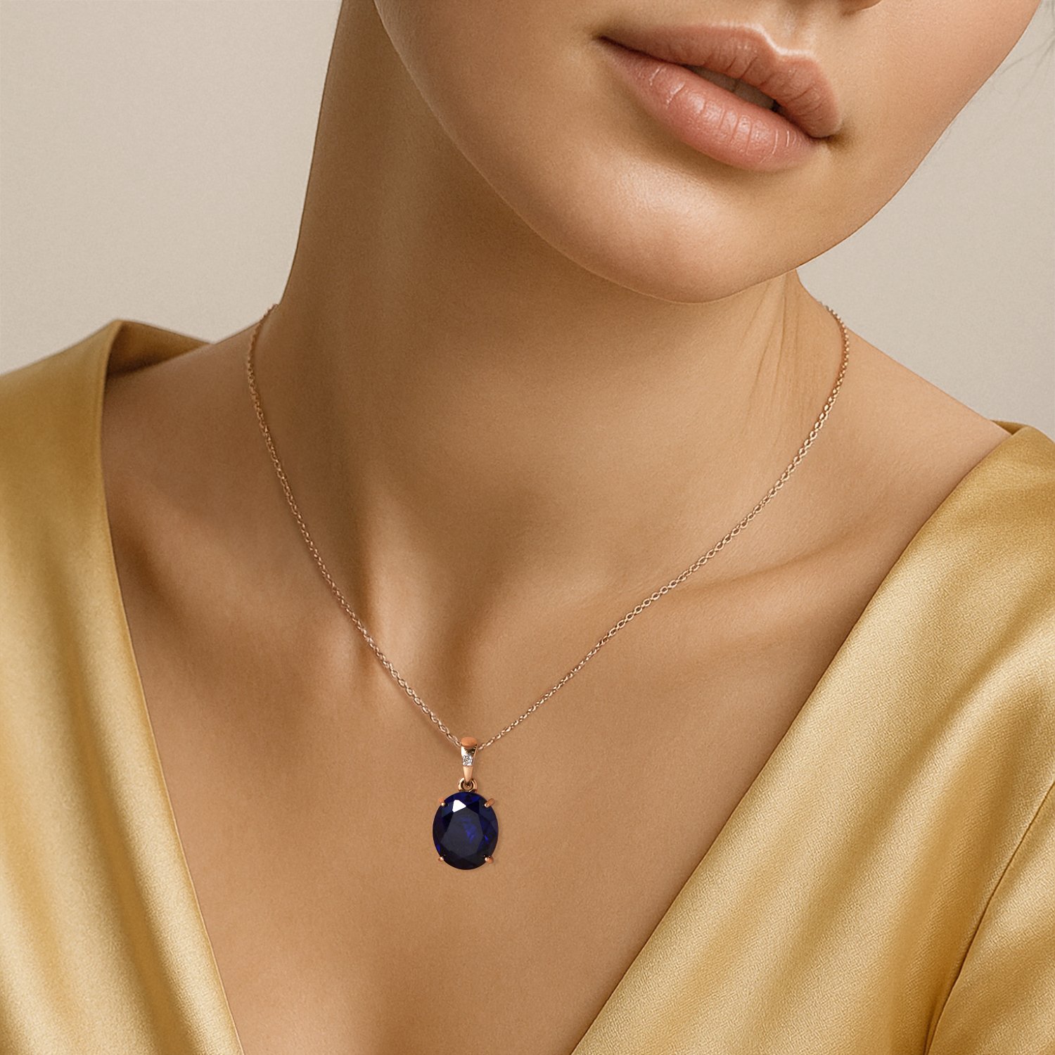 Золотая подвеска с сапфиром выращенным и бриллиантом