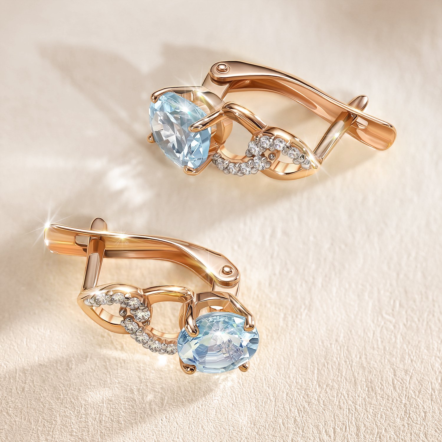 Золотые серьги с топазами Sky и фианитами