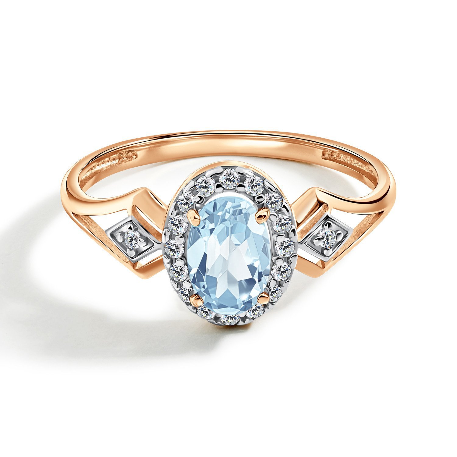 Золотое кольцо с топазом Sky и фианитами