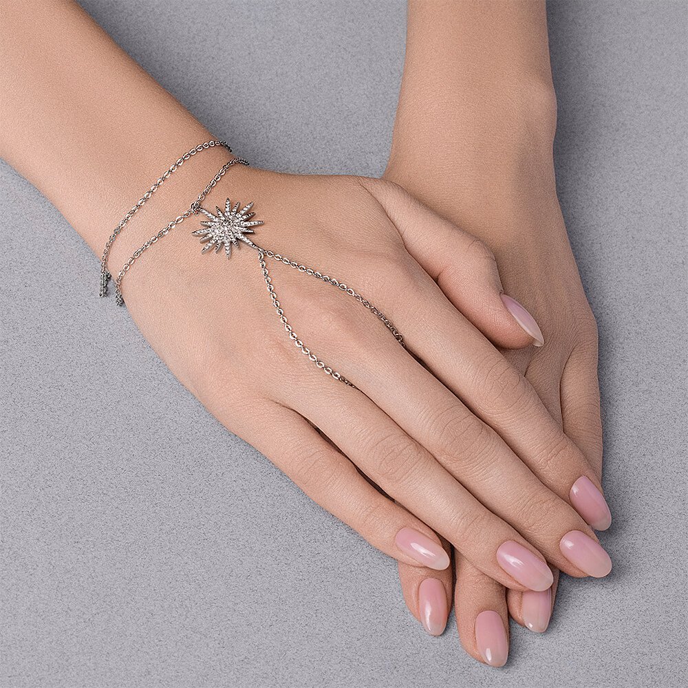 Серебряный слейв-браслет с фианитами и родированием