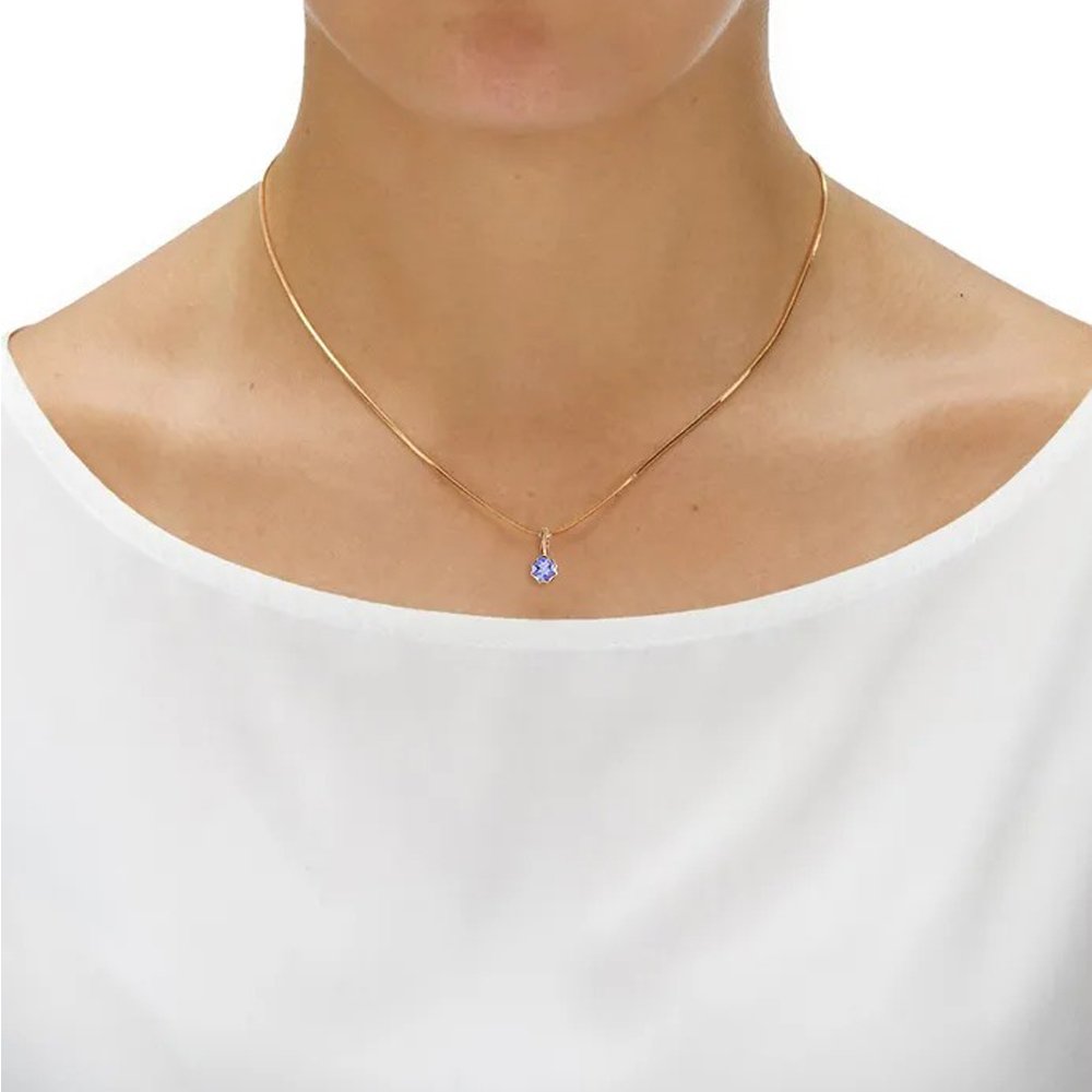 Золотая подвеска с танзанитом