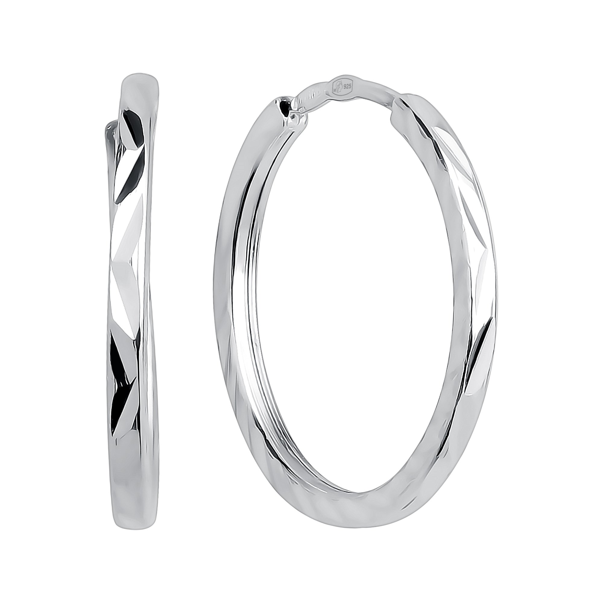 Фото «Серебряные серьги с родированием и алмазной гранью»