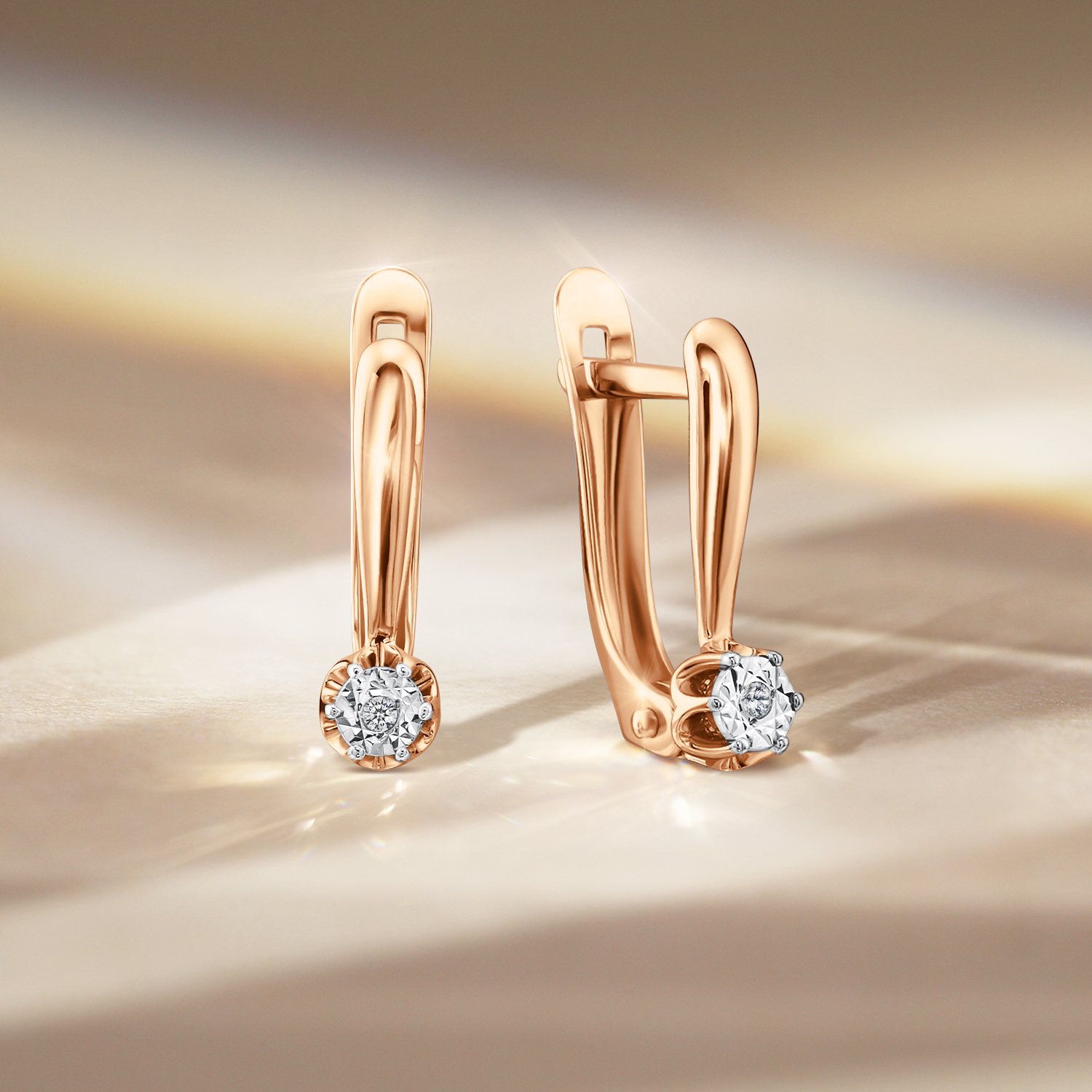 Золотые серьги с бриллиантами