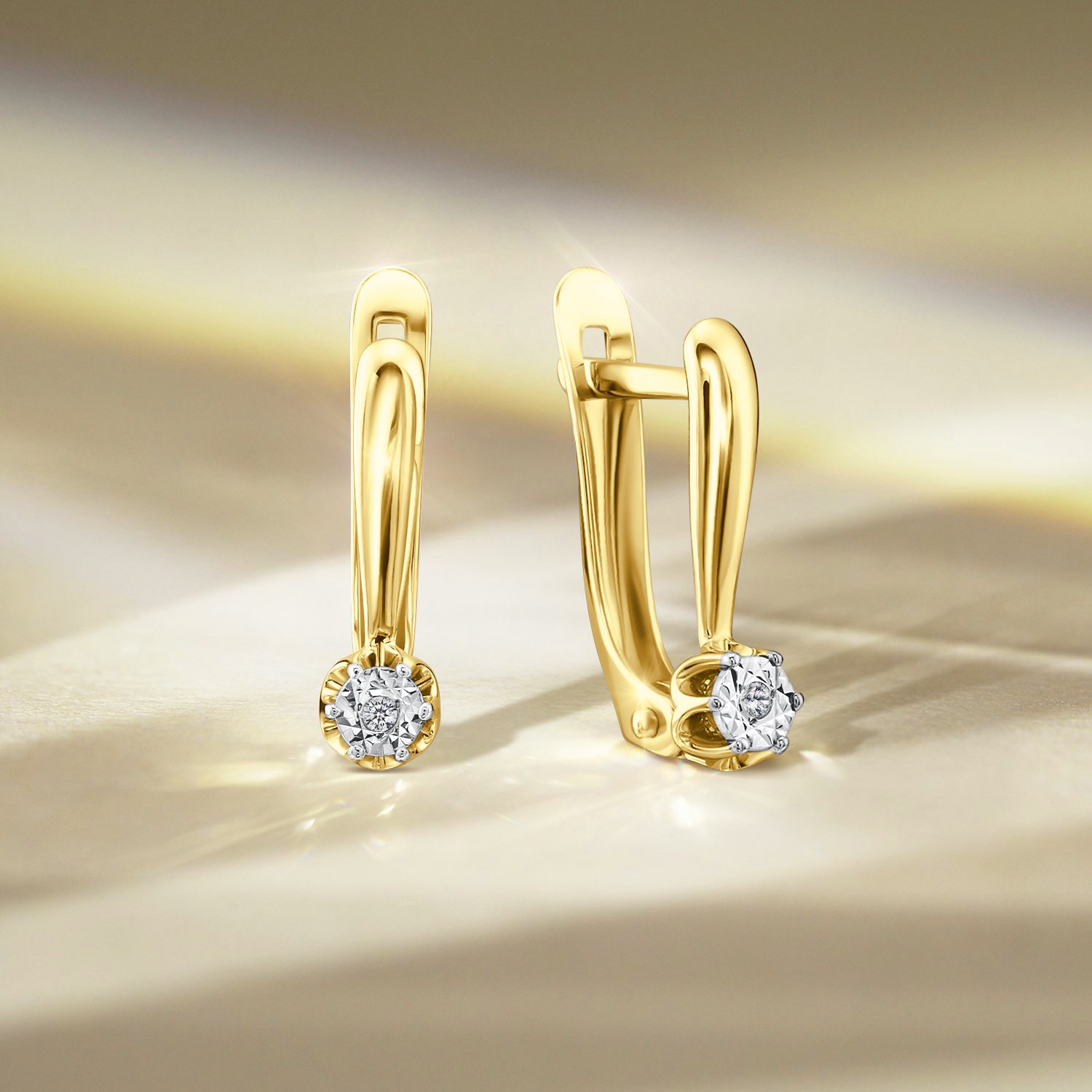 Золотые серьги с бриллиантами